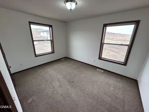 Bedroom - 4464 146w Ave NW, Williston, ND 58801 photo 7 of 8