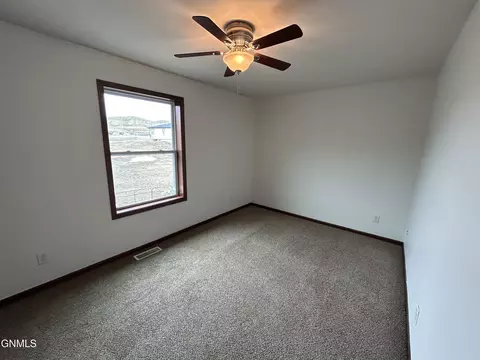 Bedroom - 4464 146w Ave NW, Williston, ND 58801 photo 5 of 8