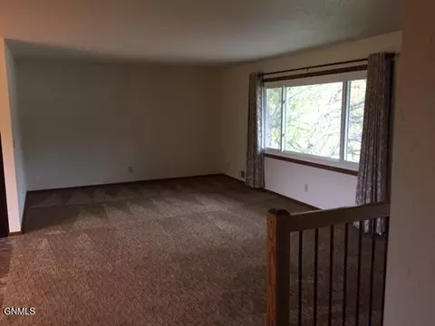 Living - 405 E Interstate Ave, Bismarck, ND 58503 photo 1 of 2