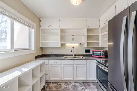 Kitchen - 909 E Avenue Ave E, Bismarck, ND 58501 photo 2 of 7