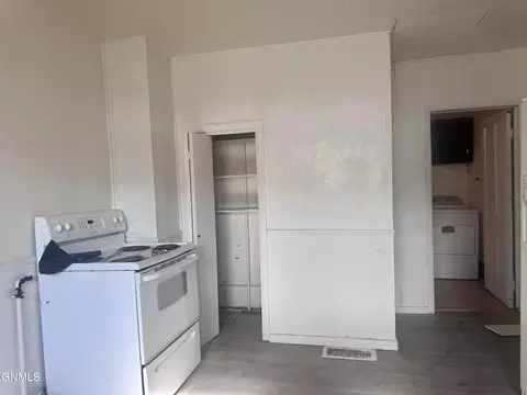 Kitchen - 134 E Broadway St, Dickinson, ND 58601 photo 3 of 5