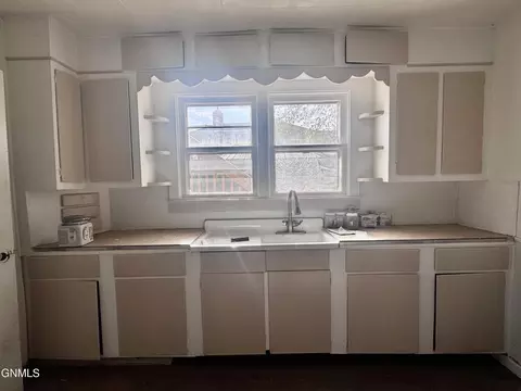 Kitchen - 134 E Broadway St, Dickinson, ND 58601 photo 2 of 5