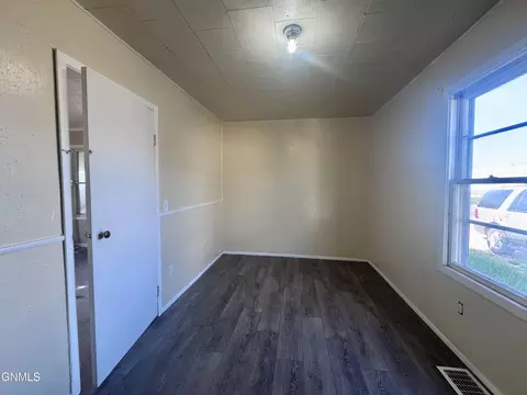 Bedroom - 134 E Broadway St, Dickinson, ND 58601 photo 2 of 8