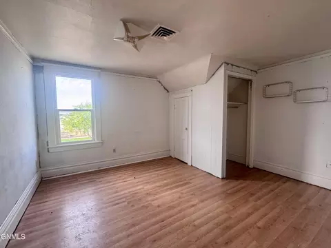 Bedroom - 134 E Broadway St, Dickinson, ND 58601 photo 3 of 8