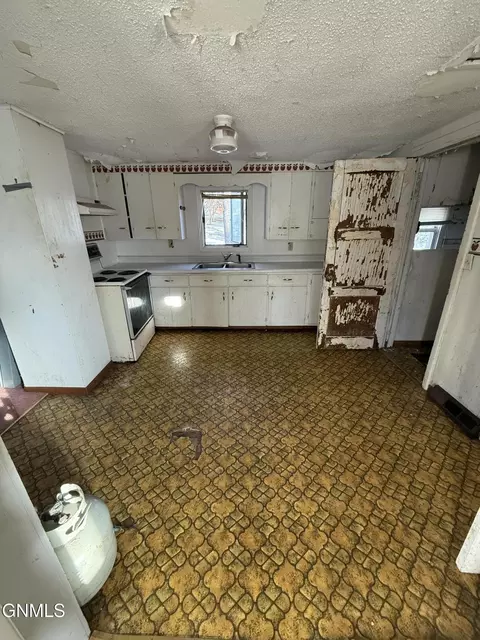 Kitchen - 510 2nd Ave E, Gackle, ND 58442 photo 2 of 2