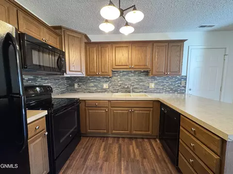 Kitchen - 1502 Cimarron Dr, Bismarck, ND 58503 photo 3 of 5