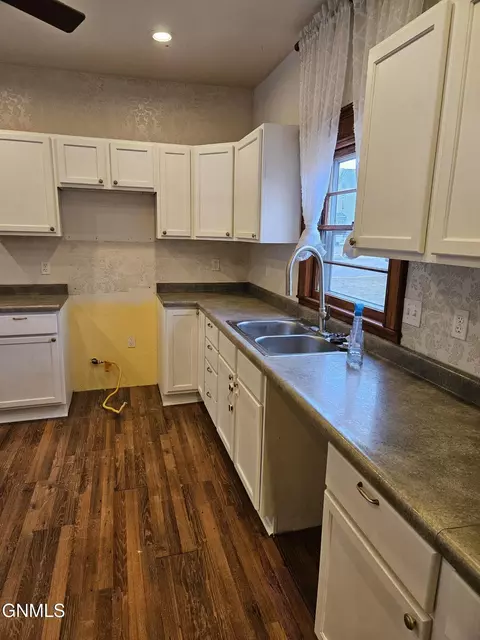 Kitchen - 230 4th Ave W, Dickinson, ND 58601 photo 5 of 5