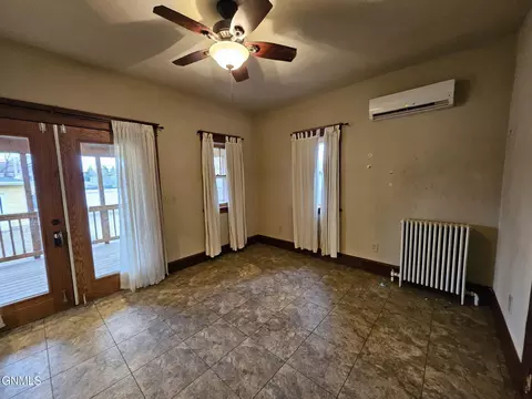 Living - 230 4th Ave W, Dickinson, ND 58601 photo 4 of 5