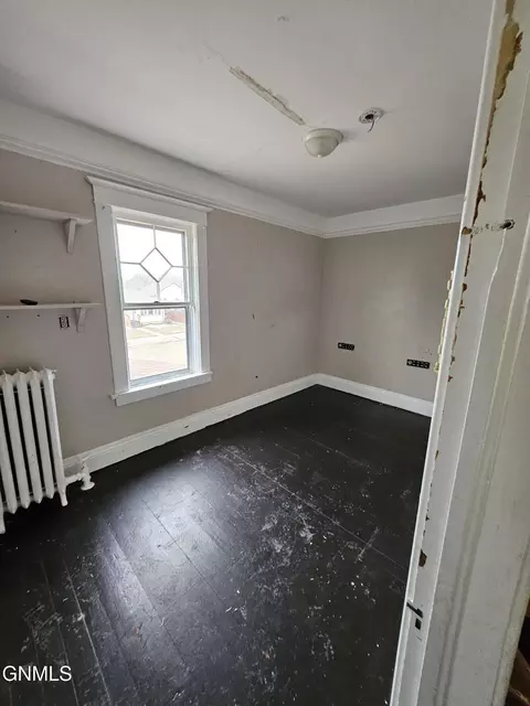 Bedroom - 230 4th Ave W, Dickinson, ND 58601 photo 2 of 4