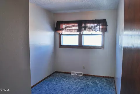 Bedroom - 105 Whitman Ave, Wilton, ND 58579 photo 1 of 3