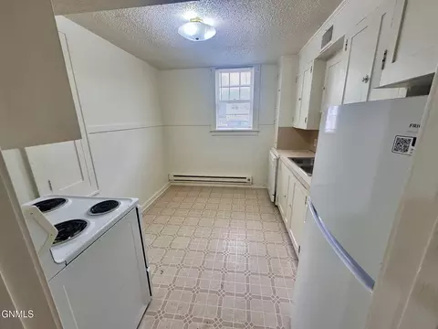 Kitchen - 314 E C Ave, Bismarck, ND 58501 photo 1 of 2