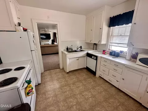 Kitchen - 314 E C Ave, Bismarck, ND 58501 photo 2 of 2