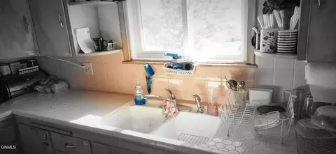 Kitchen - 1422 E Ave E, Bismarck, ND 58501 photo 2 of 3