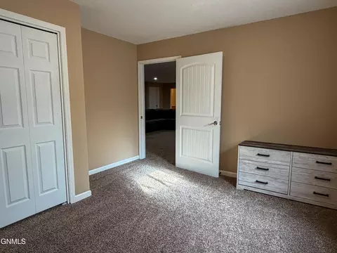 Bedroom - 648 13th St E, Dickinson, ND 58601 photo 6 of 8