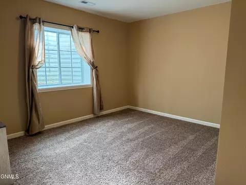 Bedroom - 648 13th St E, Dickinson, ND 58601 photo 5 of 8