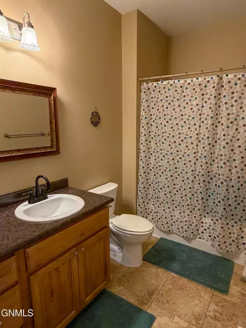 Bath - 648 13th St E, Dickinson, ND 58601 photo 1 of 4