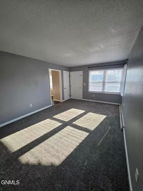 Living - 891 Dell Ave, Dickinson, ND 58601 photo 1 of 2