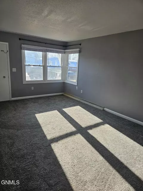 Living - 891 Dell Ave, Dickinson, ND 58601 photo 2 of 2