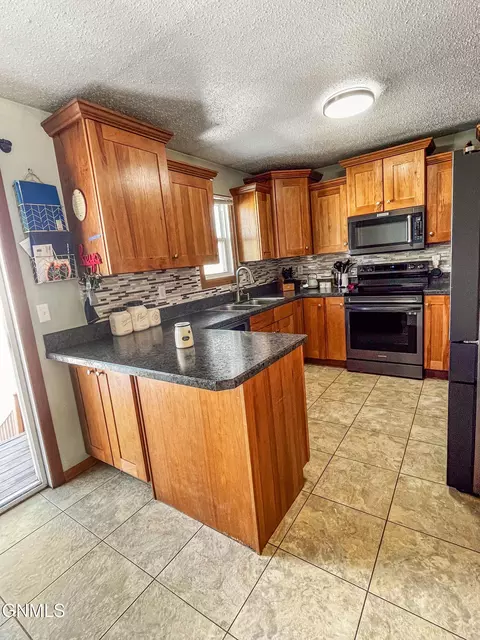 Kitchen - 1820 28th St W, Williston, ND 58801 photo 1 of 7