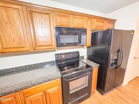 Kitchen - 719 9th St E, Williston, ND 58801 photo 2 of 2