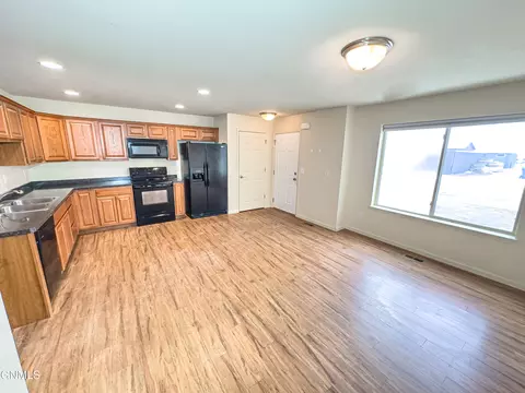 Living - 719 9th St E, Williston, ND 58801 photo 2 of 2