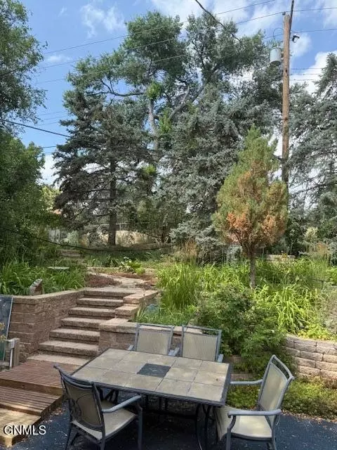 Exterior - 1120 Keating Dr, Bismarck, ND 58501 photo 4 of 11