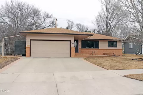 Exterior - 1120 Keating Dr, Bismarck, ND 58501 photo 8 of 11