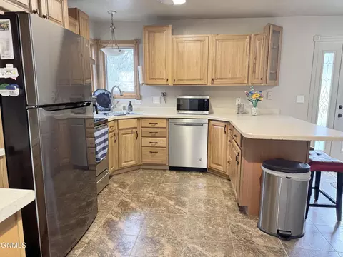 Kitchen - 1120 Keating Dr, Bismarck, ND 58501 photo 8 of 9