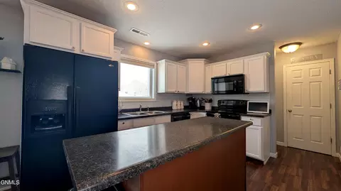 Kitchen - 624 Brome Ave, Bismarck, ND 58503 photo 3 of 6