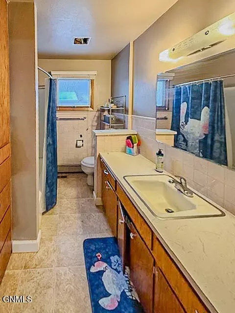 Bath - 528 Capitol Ave, Bismarck, ND 58501 photo 2 of 3