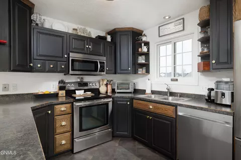 Kitchen - 127 17th St E, Dickinson, ND 58601 photo 2 of 4