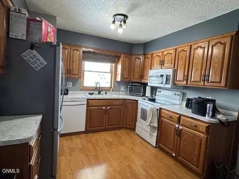 Kitchen - 858 Elm Ave, Dickinson, ND 58601 photo 2 of 2