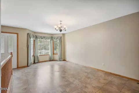 Living - 1002 Turnpike Ave E, Bismarck, ND 58501 photo 1 of 7