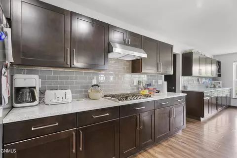 Kitchen - 5481 Sweet Clover Ln, Williston, ND 58801 photo 3 of 3