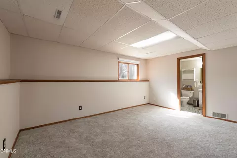 Bedroom - 21 Eckleson Rd, Lincoln, ND 58504 photo 3 of 4