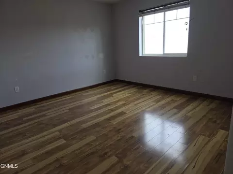 Bedroom - 1228 23rd St W, Dickinson, ND 58601 photo 2 of 2