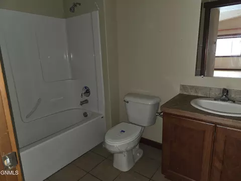 Bath - 1228 23rd St W, Dickinson, ND 58601 photo 1 of 4