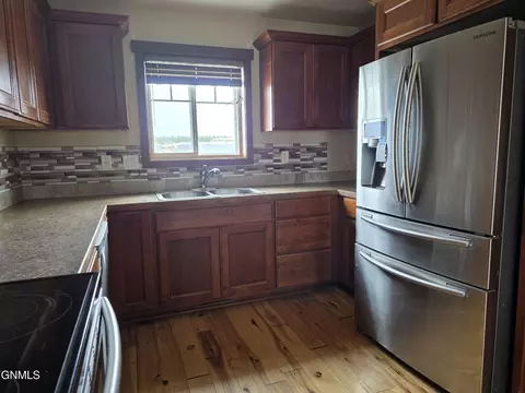Kitchen - 1228 23rd St W, Dickinson, ND 58601 photo 2 of 2