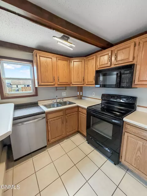 Kitchen - 802 Broadway W, Williston, ND 58801 photo 2 of 5