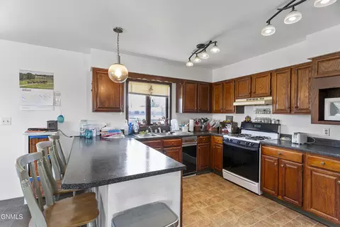 Kitchen - 128 First St E, Lambert, MT 59243 photo 3 of 3