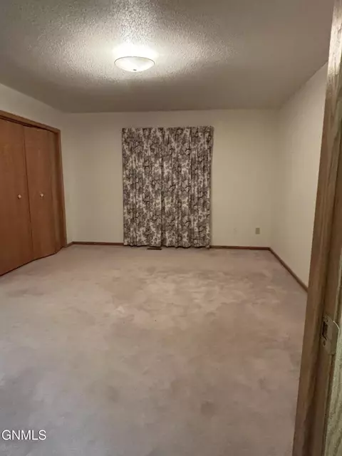 Bedroom - 1801 15th Ave W, Williston, ND 58801 photo 2 of 2