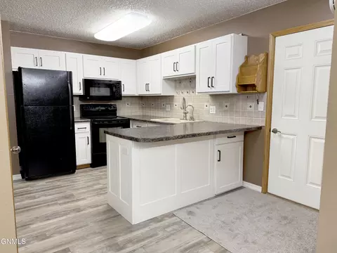 Kitchen - 1510 Cimarron Dr, Bismarck, ND 58503 photo 1 of 3
