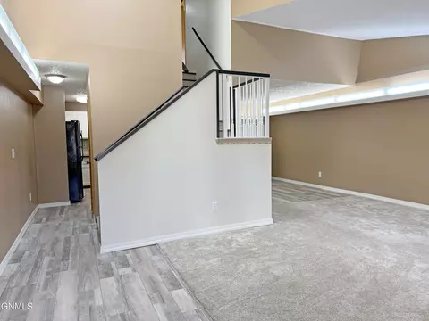 Living - 1510 Cimarron Dr, Bismarck, ND 58503 photo 4 of 9