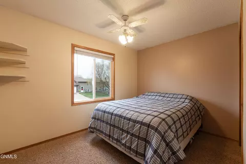 Bedroom - 12 Stanley Dr, Lincoln, ND 58504 photo 2 of 4