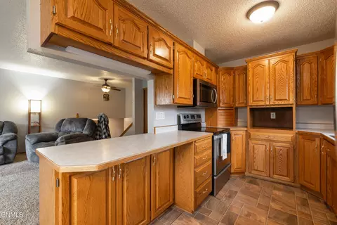 Kitchen - 12 Stanley Dr, Lincoln, ND 58504 photo 2 of 2