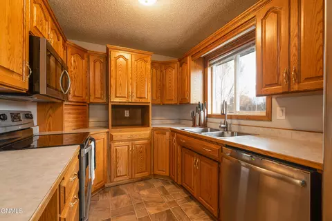 Kitchen - 12 Stanley Dr, Lincoln, ND 58504 photo 1 of 2