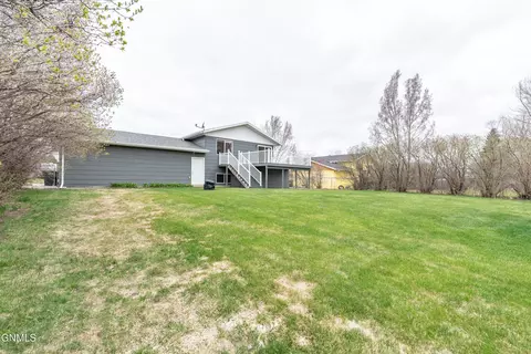 Exterior - 12 Stanley Dr, Lincoln, ND 58504 photo 4 of 5