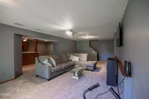 Living - 414 E Brandon Dr, Bismarck, ND 58503 photo 5 of 5