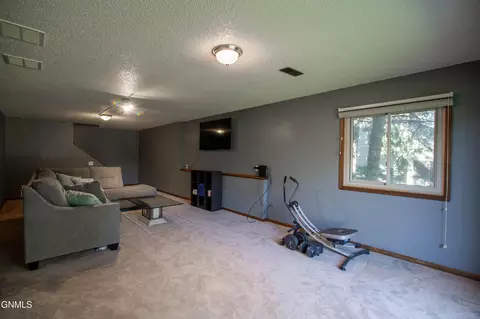 Living - 414 E Brandon Dr, Bismarck, ND 58503 photo 4 of 5