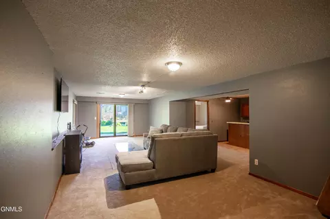 Living - 414 E Brandon Dr, Bismarck, ND 58503 photo 2 of 5